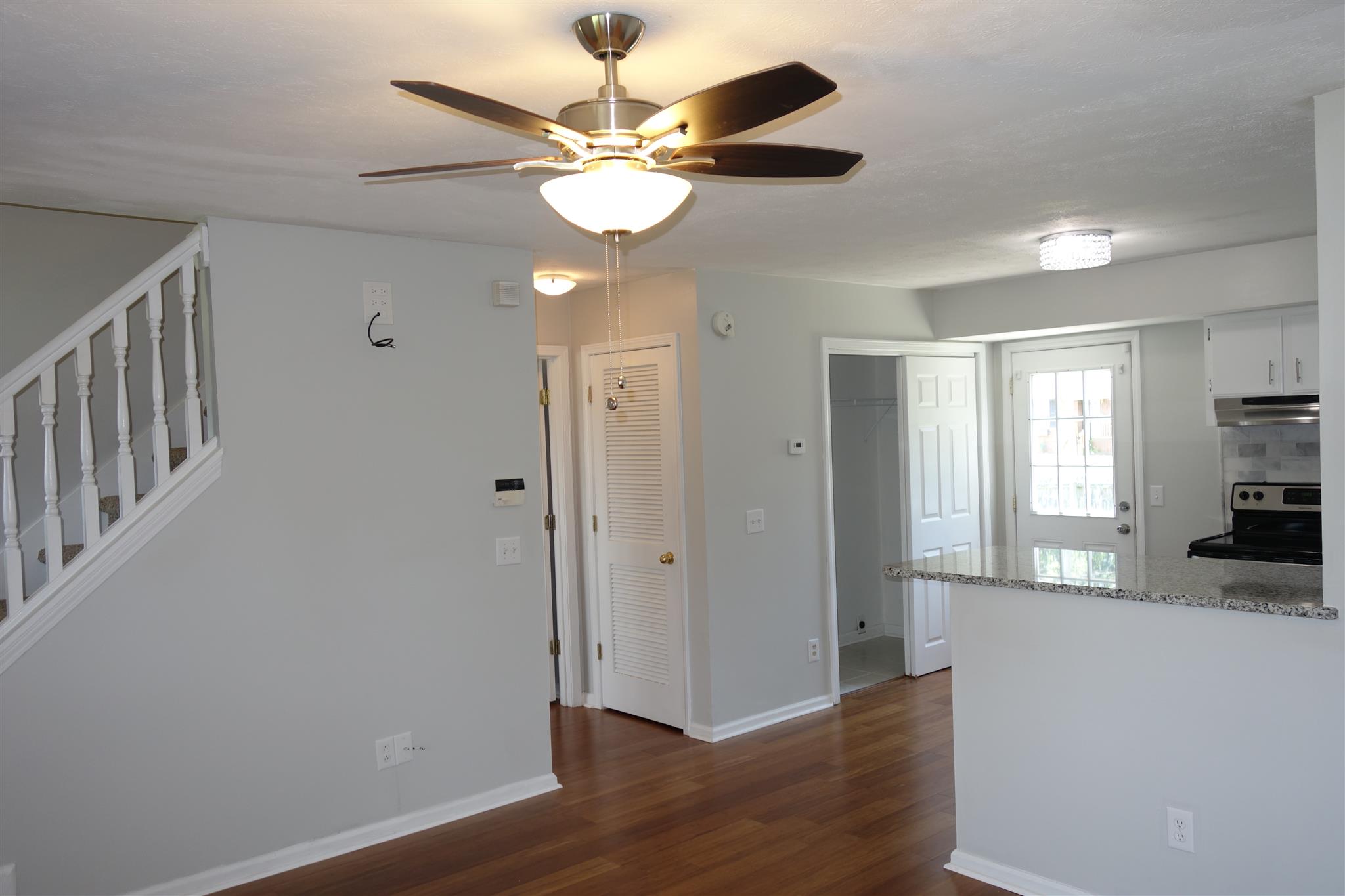 1545 Ridgemont Drive La Vergne, TN 37086 - Photo 6 of 25 wooden floor in an empty room with a window
