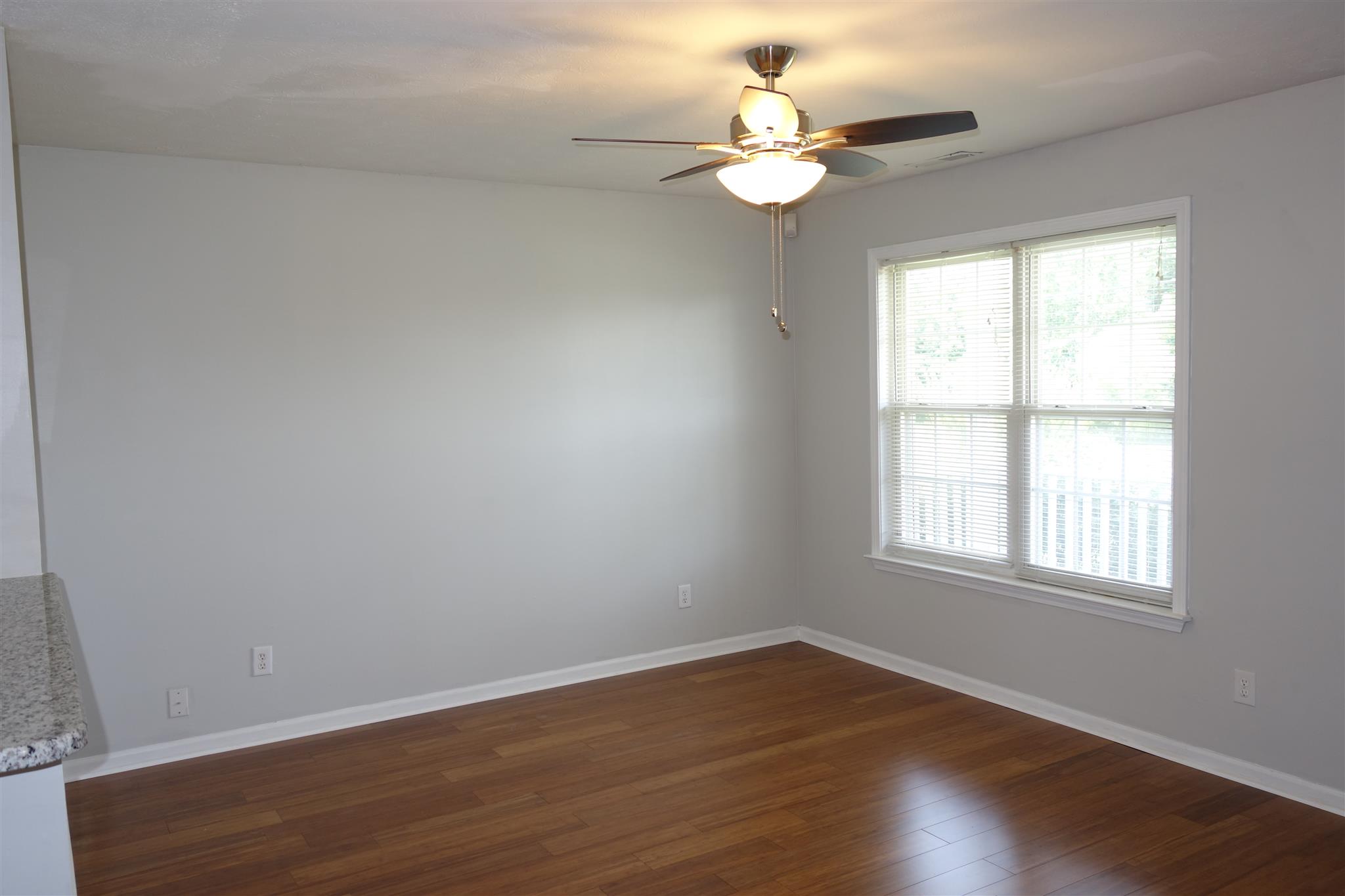 1545 Ridgemont Drive La Vergne, TN 37086 - Photo 10 of 25 an empty room with wooden floor and window