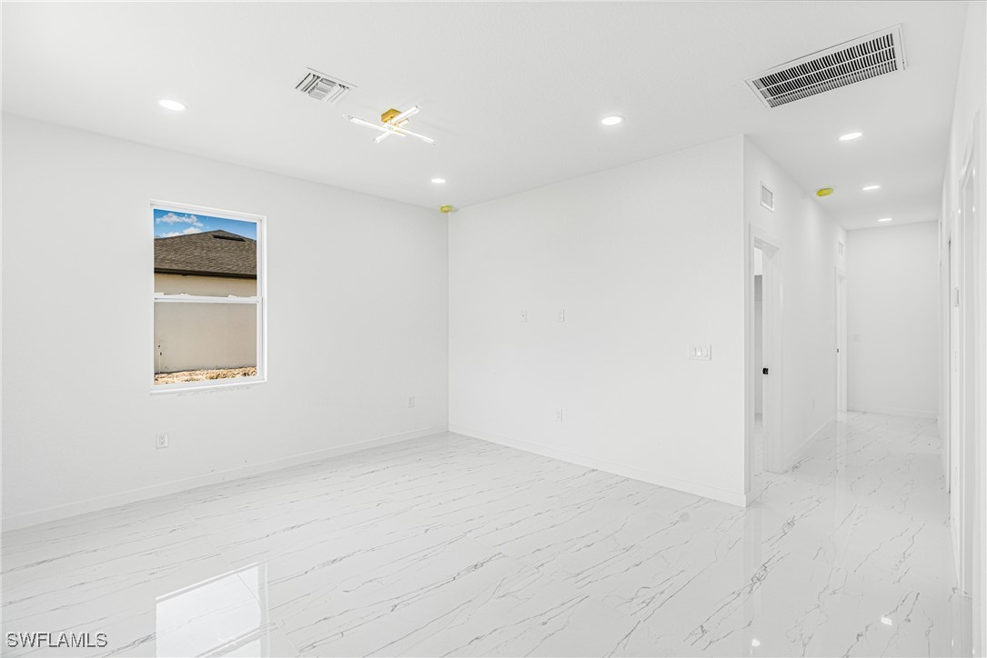 3604 26th Street Southwest Lehigh Acres, FL 33976 - Photo 24 of 38 a view of an empty room