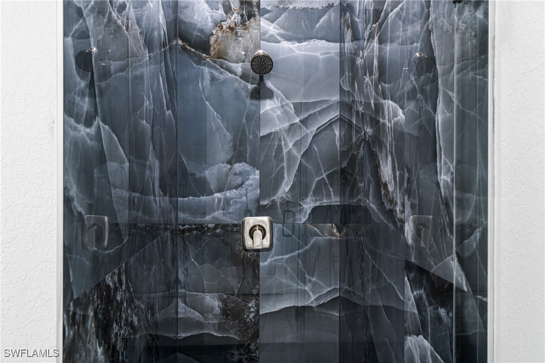 3604 26th Street Southwest Lehigh Acres, FL 33976 - Photo 25 of 38 a bathroom with a shower