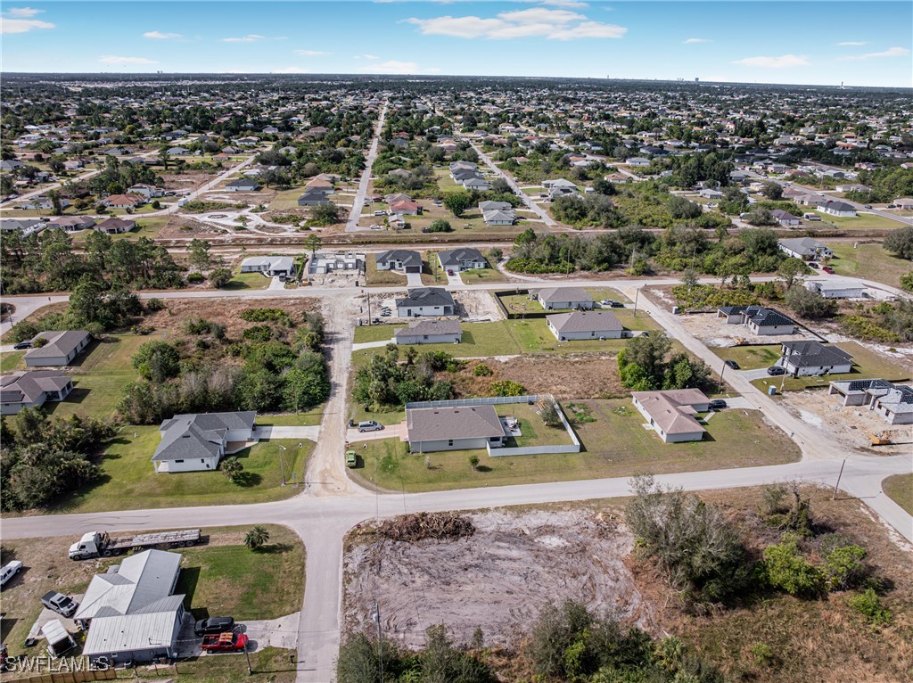 3604 26th Street Southwest Lehigh Acres, FL 33976 - Photo 32 of 38 an aerial view of a city