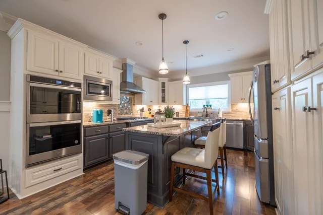a kitchen with a sink and a window