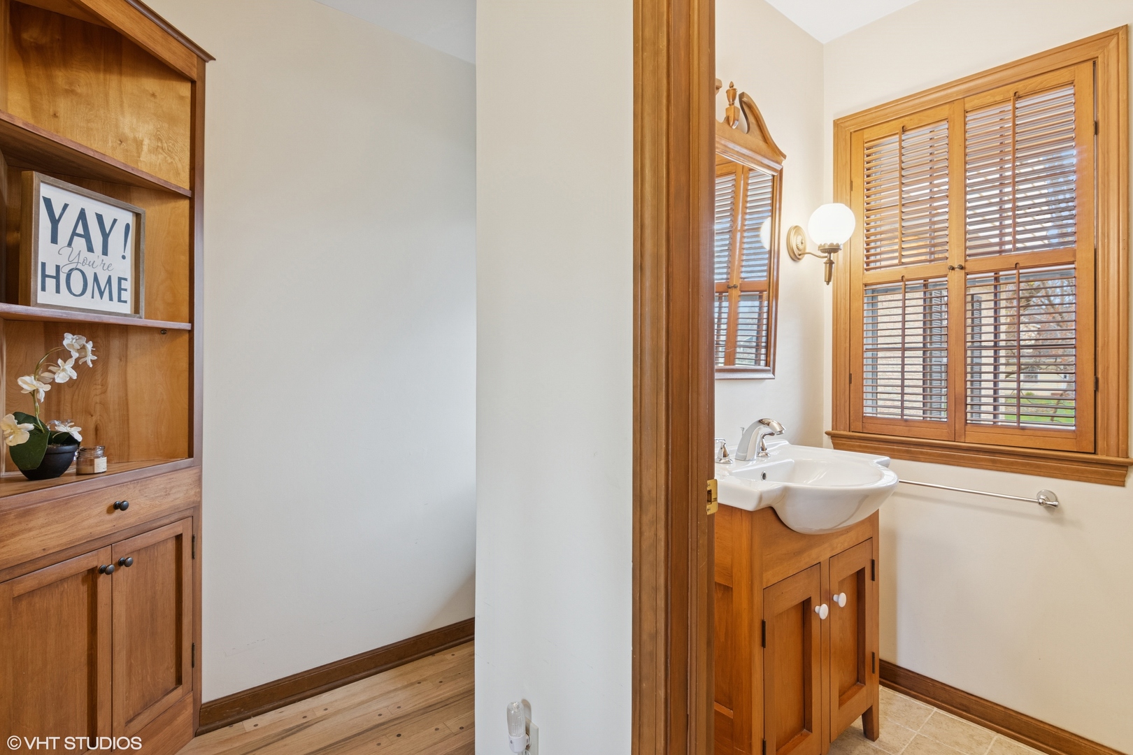 429 Grant Avenue Geneva, IL 60134 - Photo 17 of 34 a bathroom with a sink a vanity and a mirror