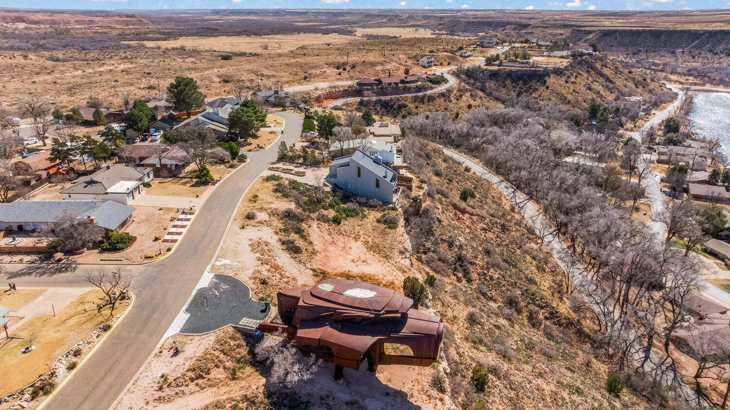 87 East Canyonview Drive Ransom Canyon, TX 79366 - Photo 11 of 42 an aerial view of multiple house with yard