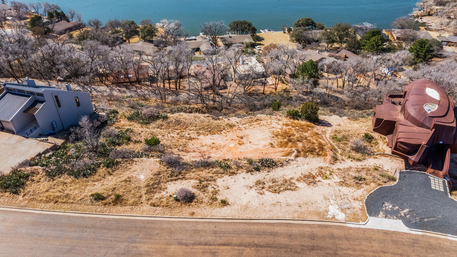 87 East Canyonview Drive Ransom Canyon, TX 79366 - Photo 30 of 42 a view of fireplace with wooden floor