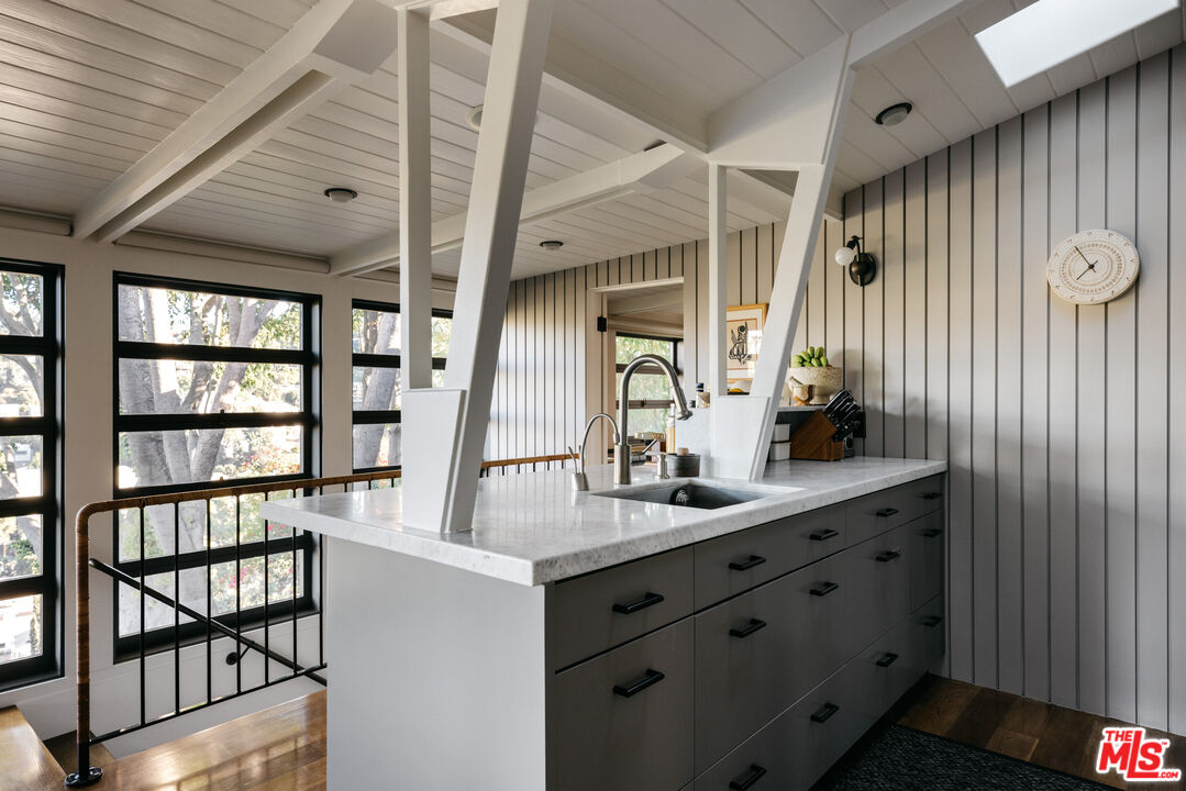 2044 Mayview Drive Los Angeles, CA 90027 - Photo 12 of 44 a bathroom with a double vanity sink and a large mirror
