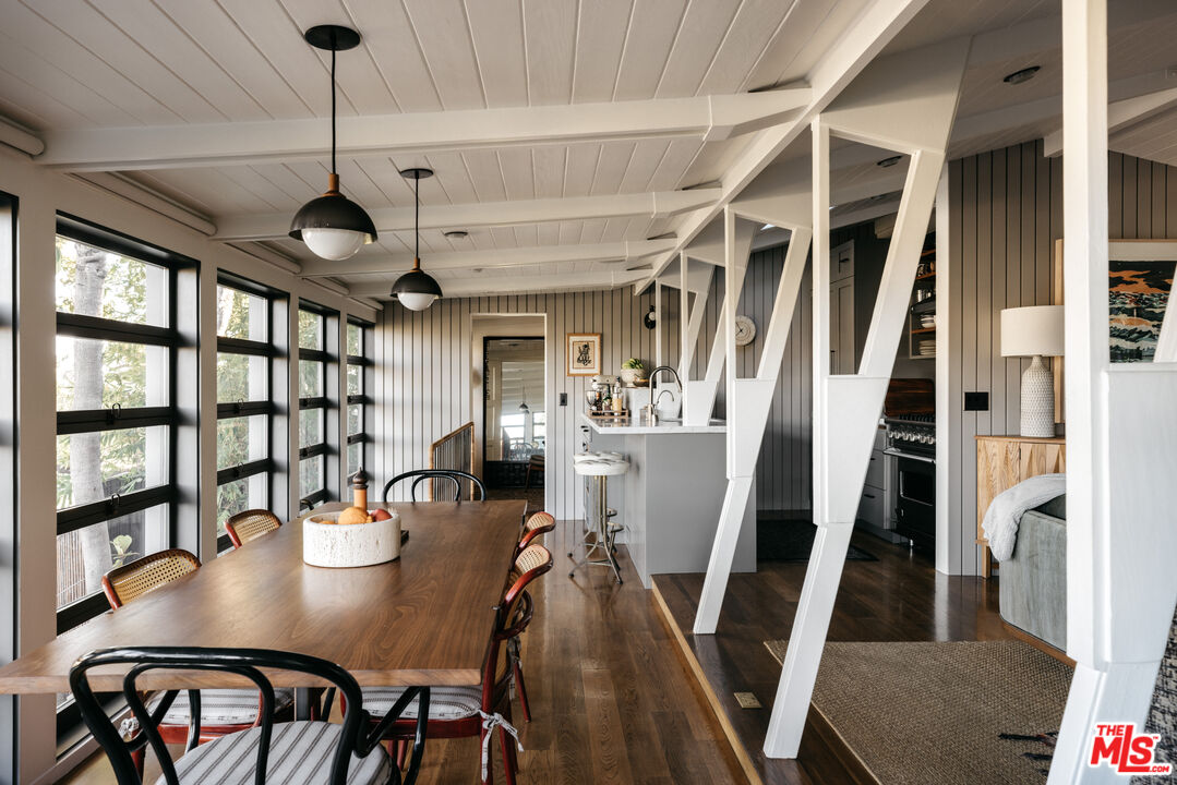 2044 Mayview Drive Los Angeles, CA 90027 - Photo 19 of 44 a view of a dining room with furniture window and wooden floor