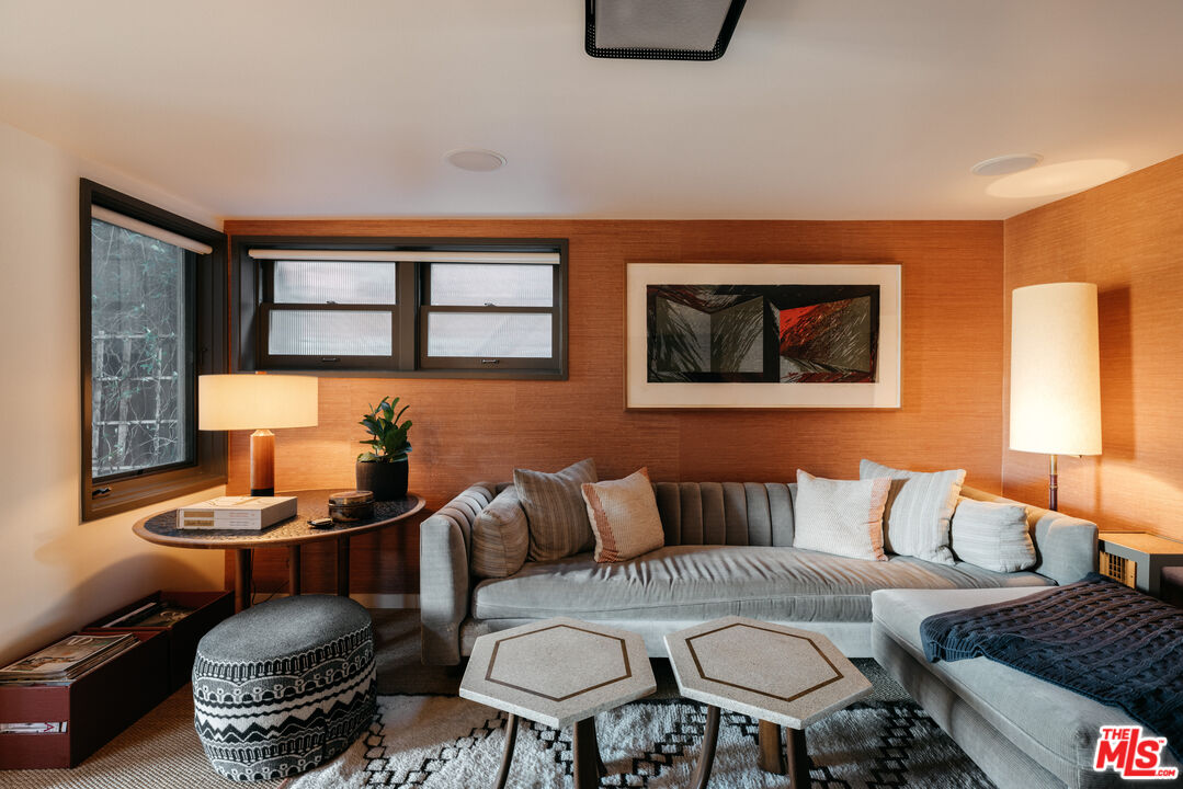 2044 Mayview Drive Los Angeles, CA 90027 - Photo 28 of 44 a living room with furniture and a table