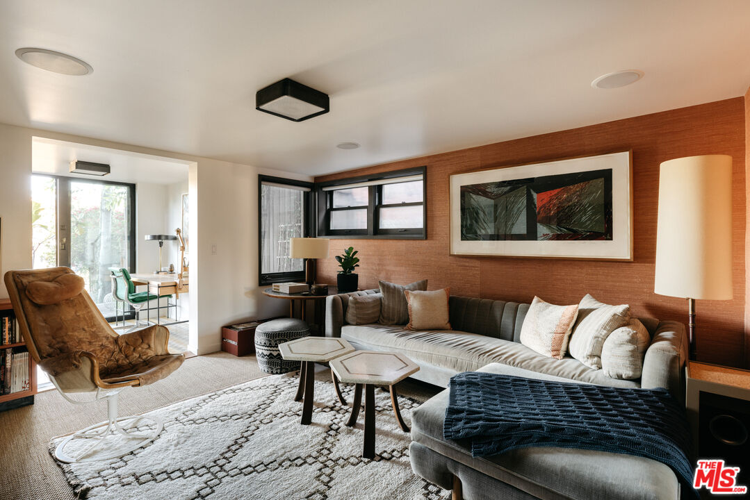 2044 Mayview Drive Los Angeles, CA 90027 - Photo 29 of 44 a living room with furniture and painting on the wall