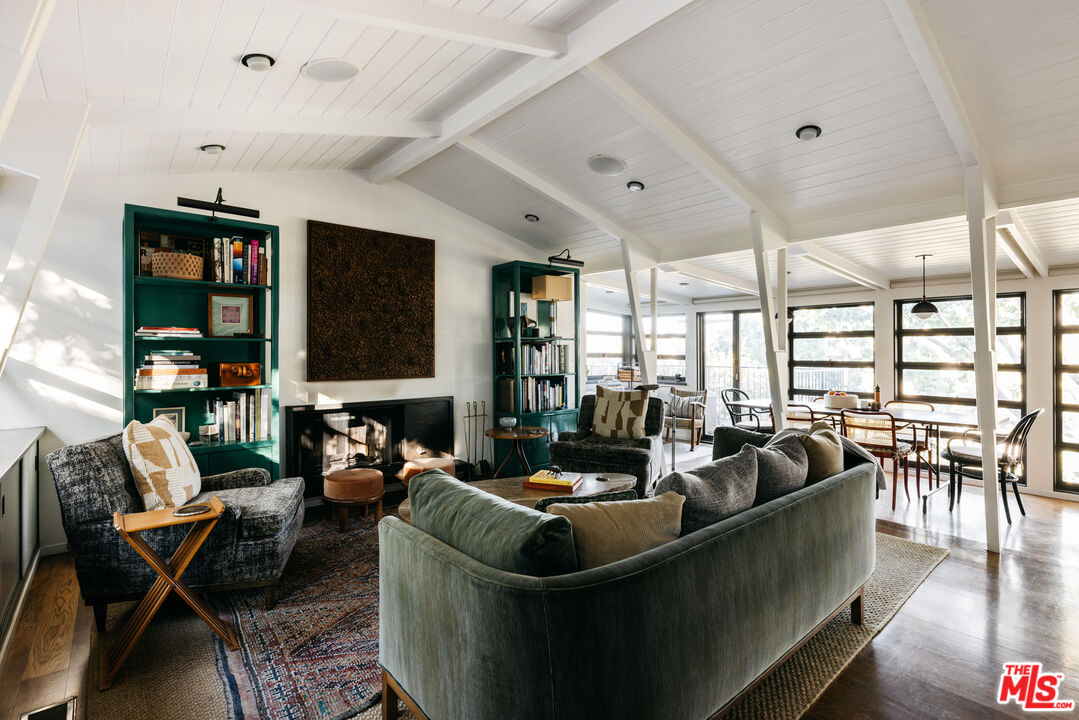 2044 Mayview Drive Los Angeles, CA 90027 - Photo 3 of 44 a living room with furniture and a flat screen tv