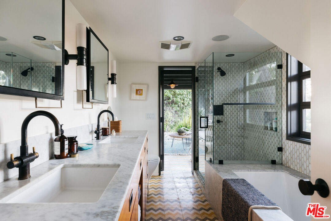 2044 Mayview Drive Los Angeles, CA 90027 - Photo 34 of 44 a kitchen with a refrigerator and a sink