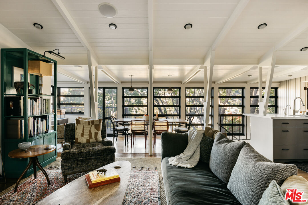 2044 Mayview Drive Los Angeles, CA 90027 - Photo 4 of 44 a living room with furniture a rug and a large window