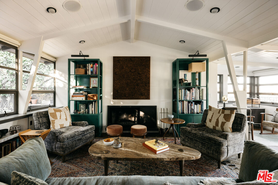 2044 Mayview Drive Los Angeles, CA 90027 - Photo 5 of 44 a living room with furniture and a fireplace