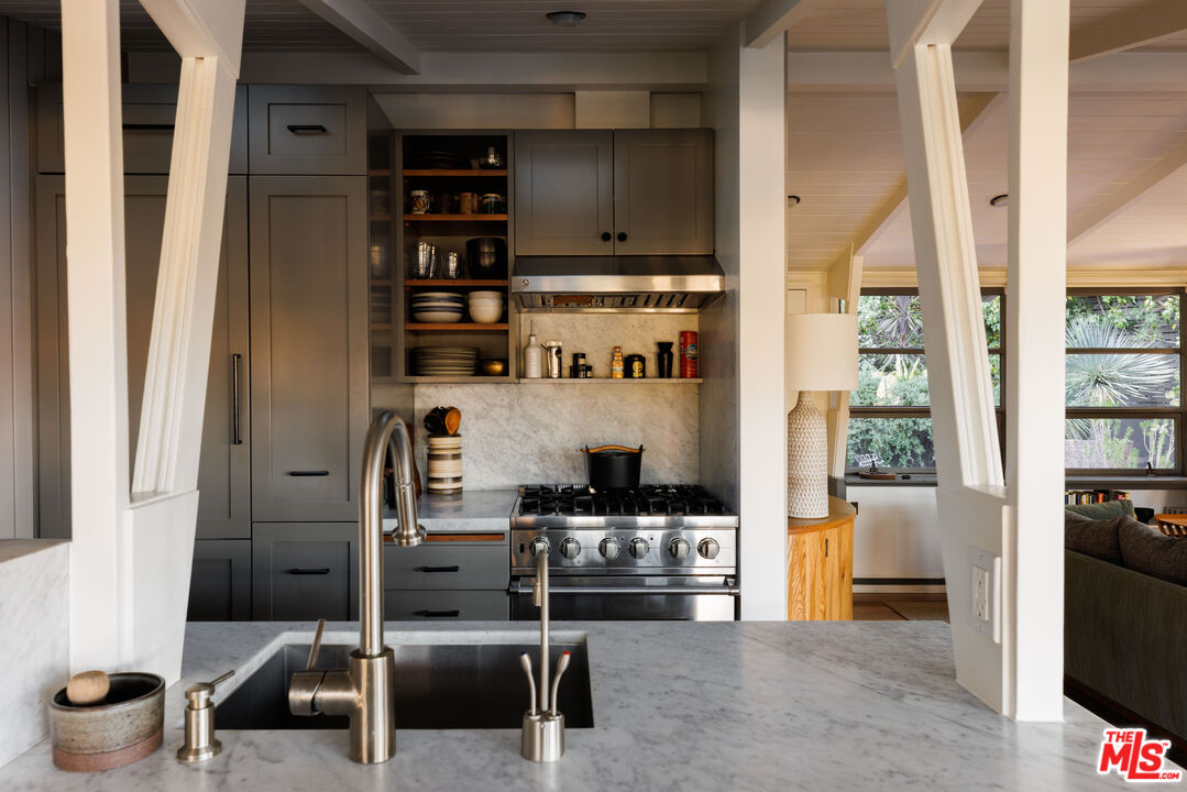 2044 Mayview Drive Los Angeles, CA 90027 - Photo 9 of 44 a room with furniture and a window