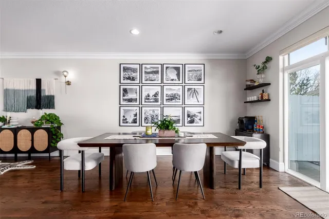 a view of a dining room with furniture and window