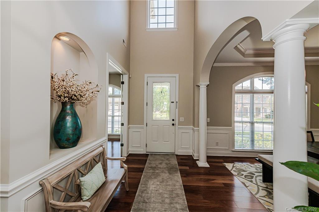 651 Quicksilver Trail Fort Mill, SC 29708 - Photo 3 of 37 a view of a entryway door with wooden floor