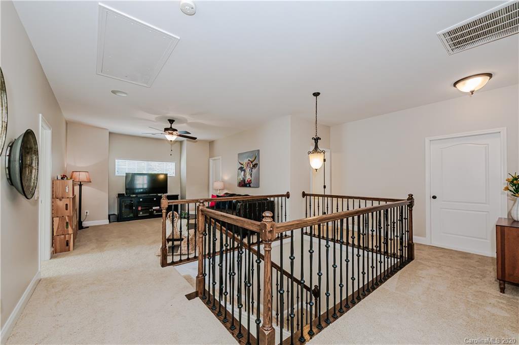 651 Quicksilver Trail Fort Mill, SC 29708 - Photo 21 of 37 a view of a livingroom with furniture and windows