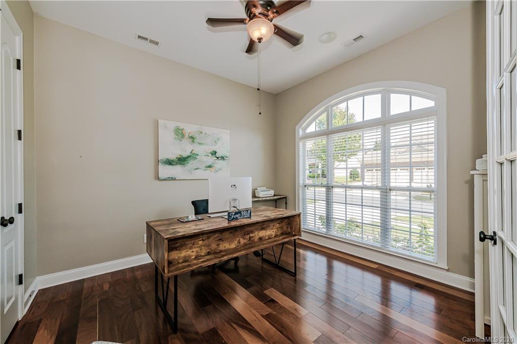 651 Quicksilver Trail Fort Mill, SC 29708 - Photo 4 of 37 a workspace with wooden floor
