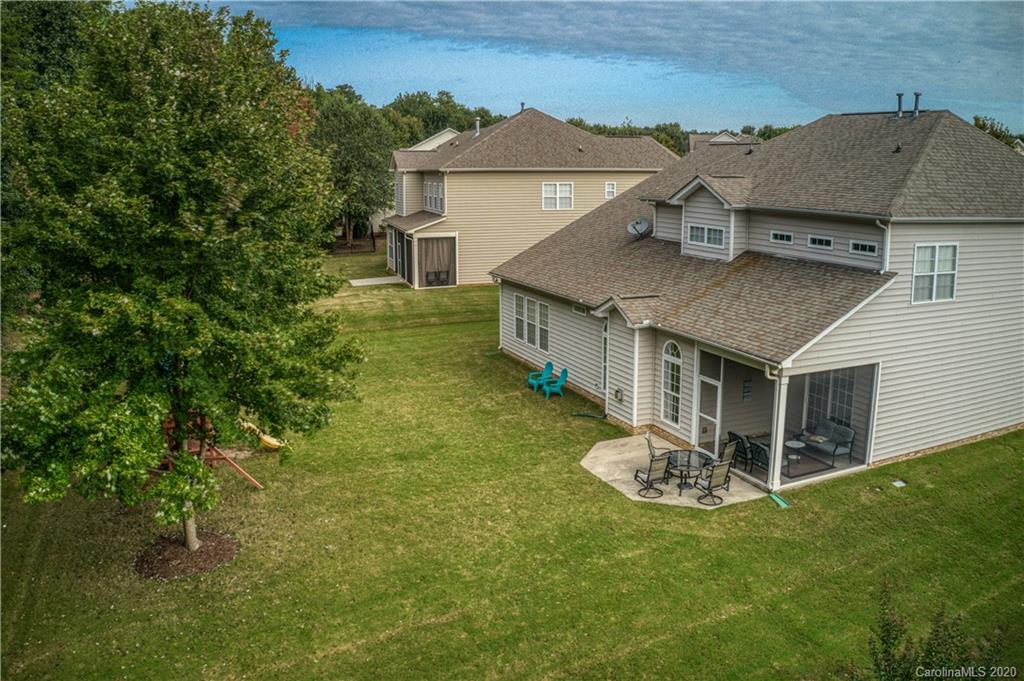 651 Quicksilver Trail Fort Mill, SC 29708 - Photo 34 of 37 a aerial view of a house with a yard table and chairs