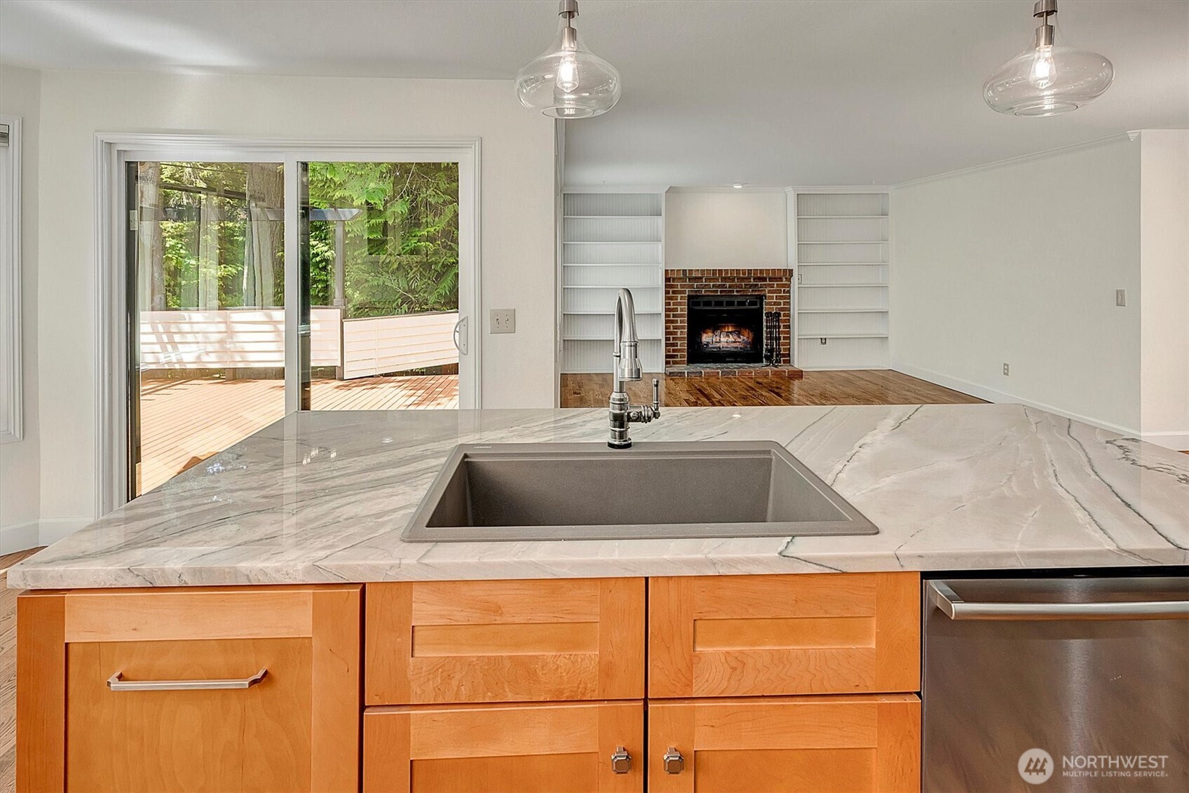 1918 238th Street Southeast Bothell, WA 98021 - Photo 13 of 36 a kitchen with granite countertop a sink and a stove