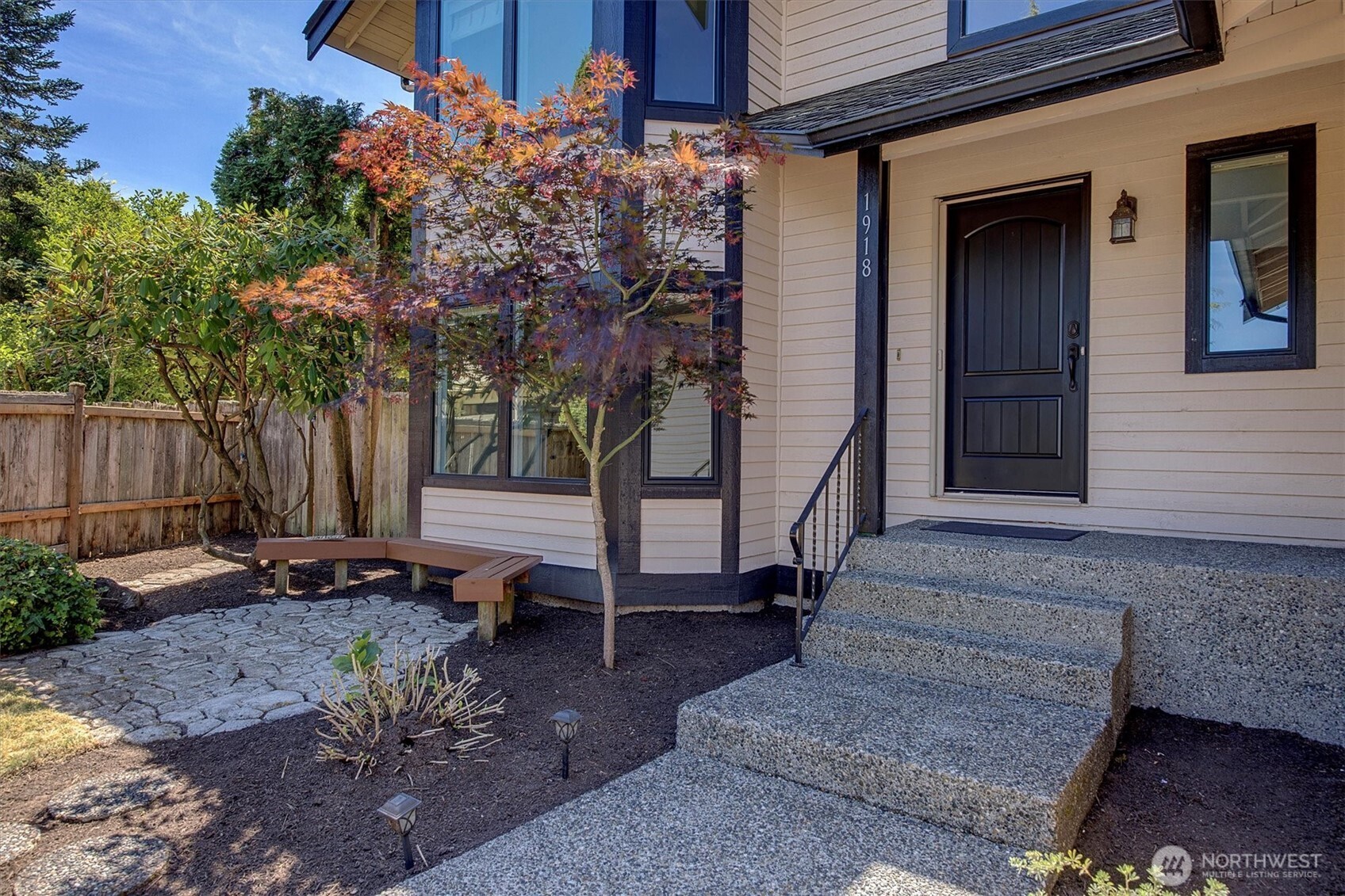 1918 238th Street Southeast Bothell, WA 98021 - Photo 2 of 36 a backyard of a house with barbeque oven and outdoor seating