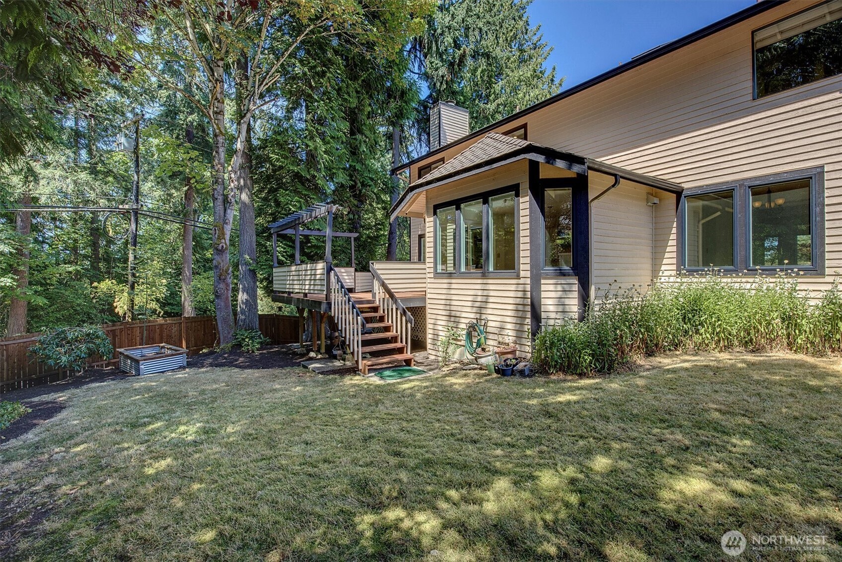 1918 238th Street Southeast Bothell, WA 98021 - Photo 31 of 36 a view of a house with backyard