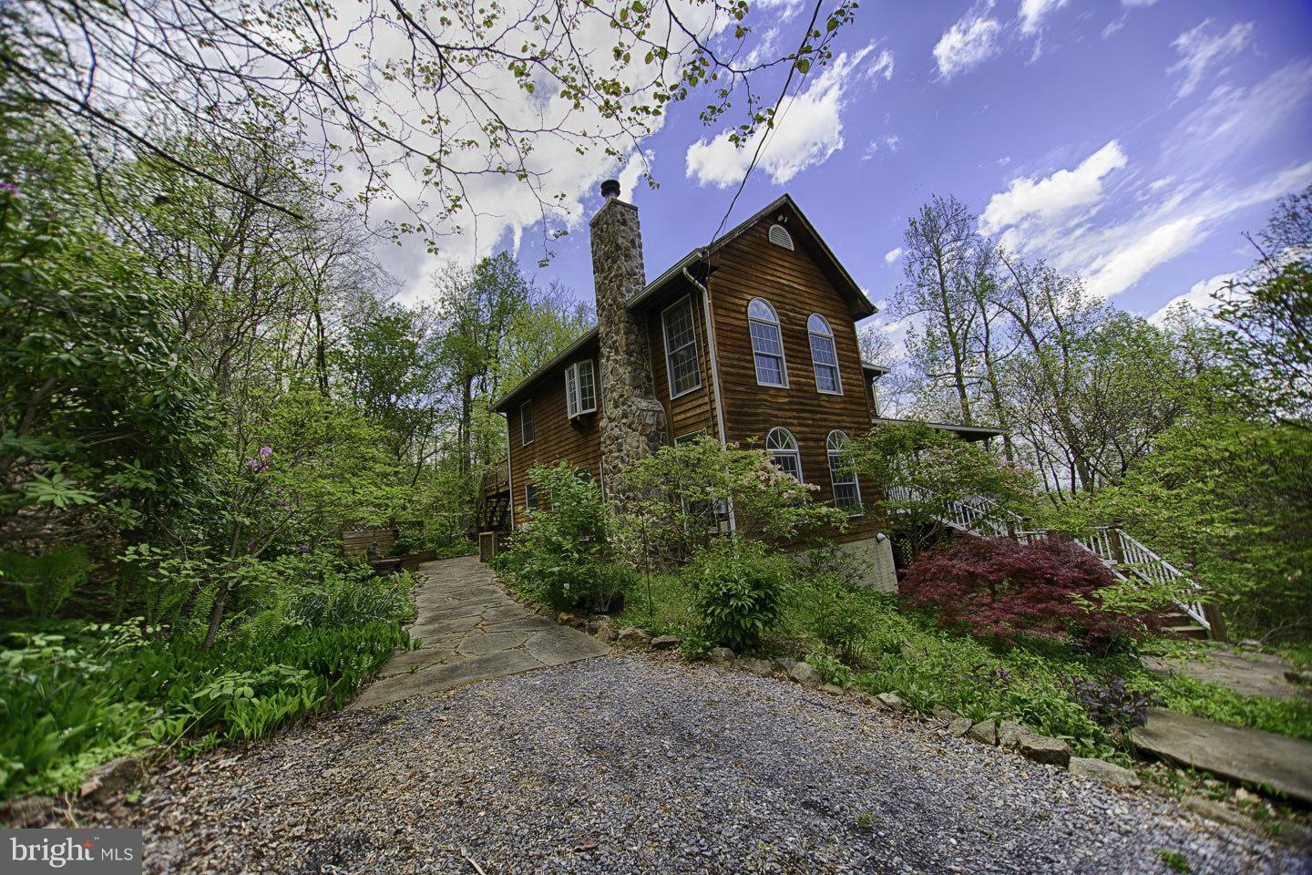 930 Pomeroy Road Front Royal, VA 22630 - Photo 1 of 30 a front view of a house with a yard