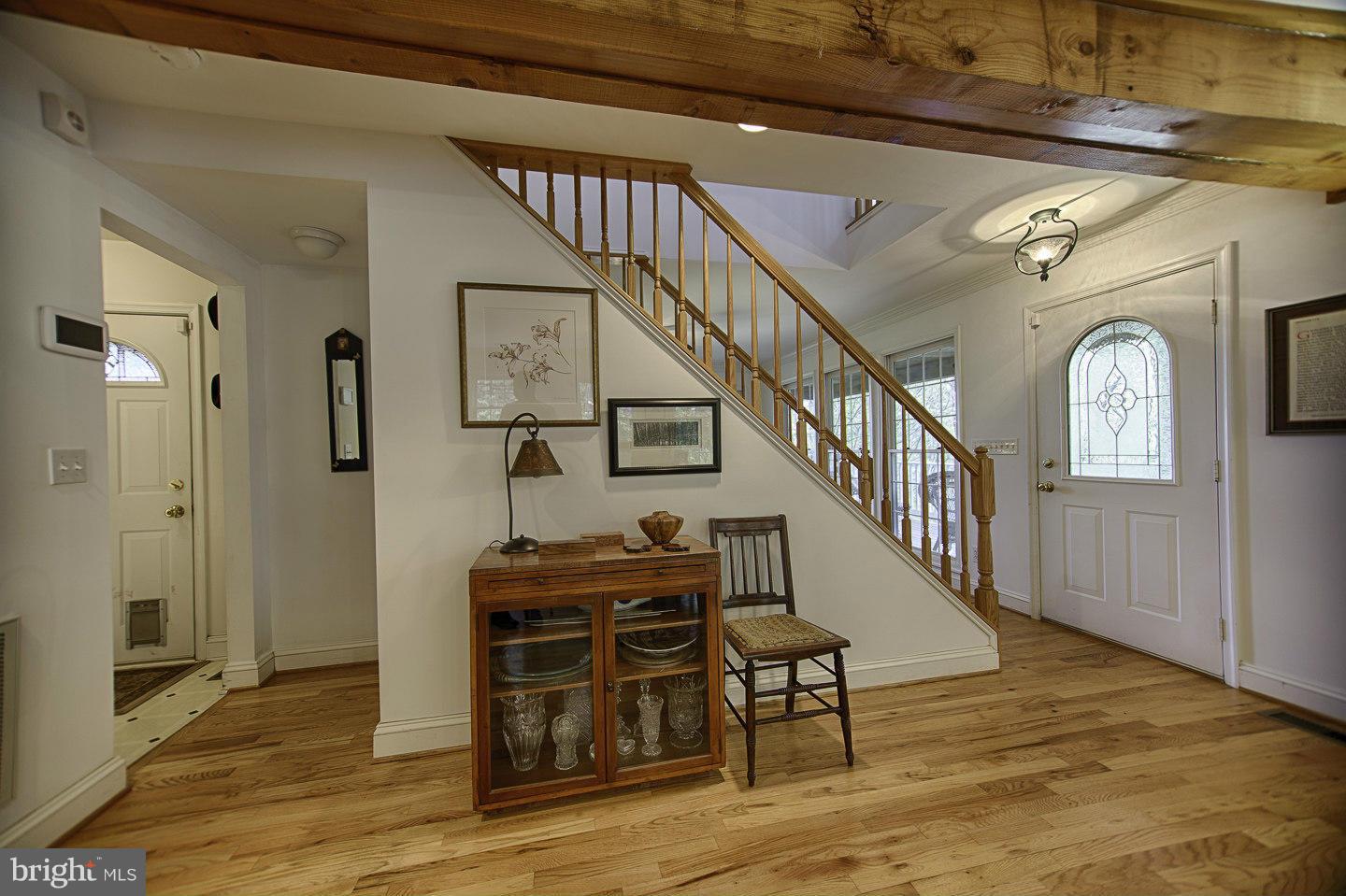 930 Pomeroy Road Front Royal, VA 22630 - Photo 17 of 30 a view of entryway and hall with wooden floor