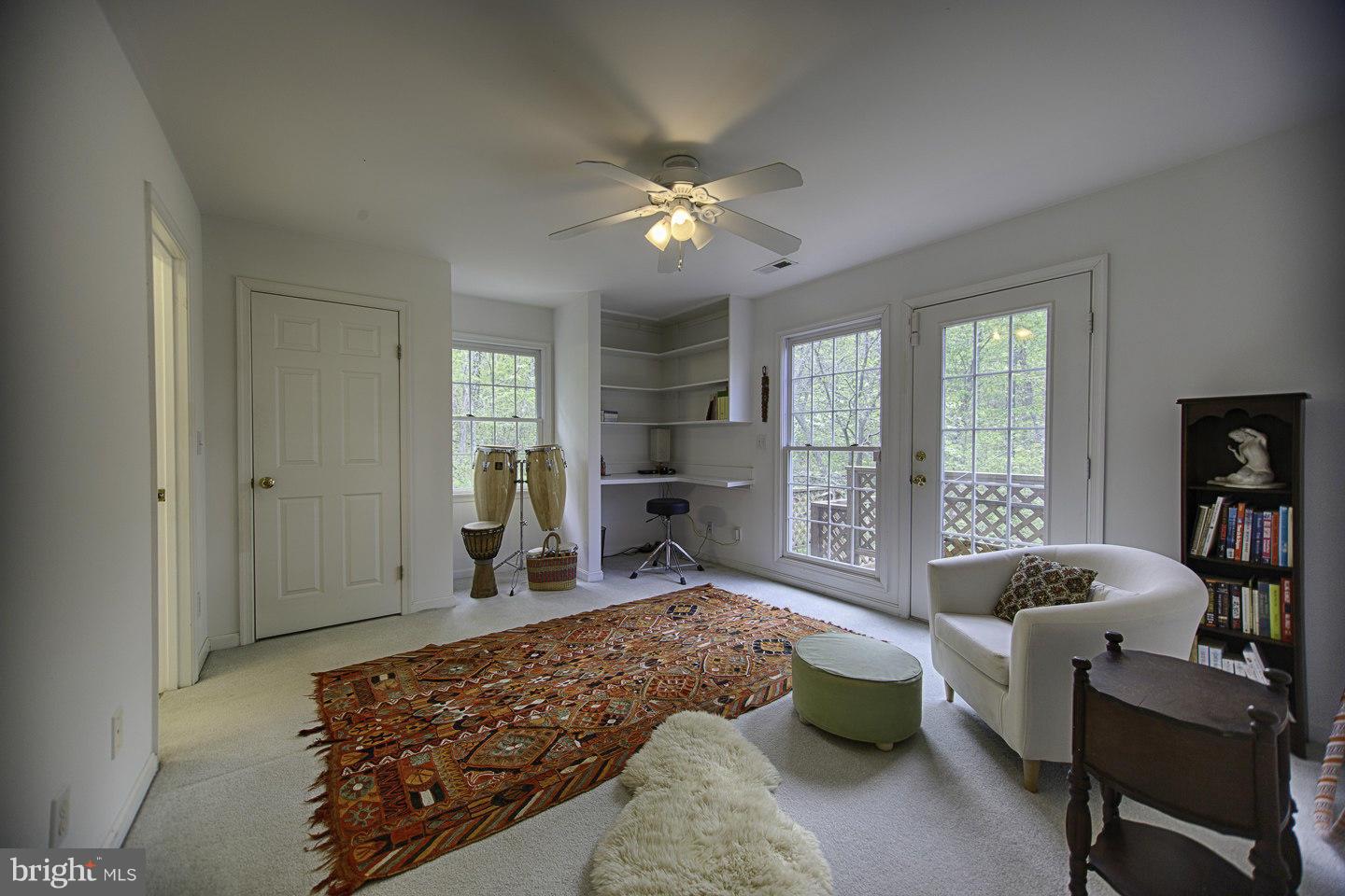 930 Pomeroy Road Front Royal, VA 22630 - Photo 18 of 30 a living room with furniture and a chandelier