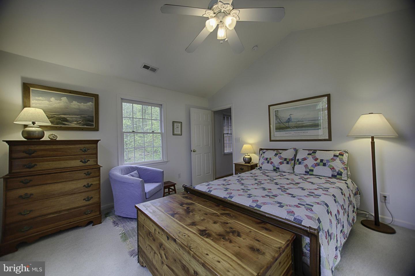 930 Pomeroy Road Front Royal, VA 22630 - Photo 27 of 30 a bedroom with a bed and a dresser