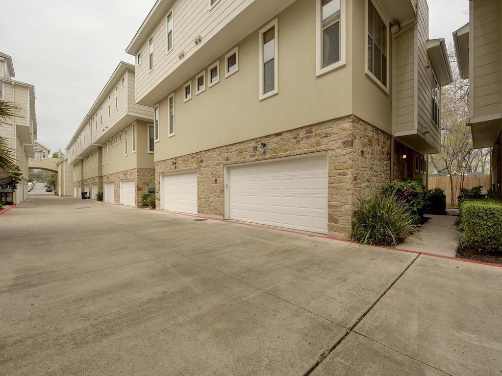 1115 Kinney Avenue, Unit 41 Austin, TX 78704 - Photo 2 of 26 a view of a street with buildings