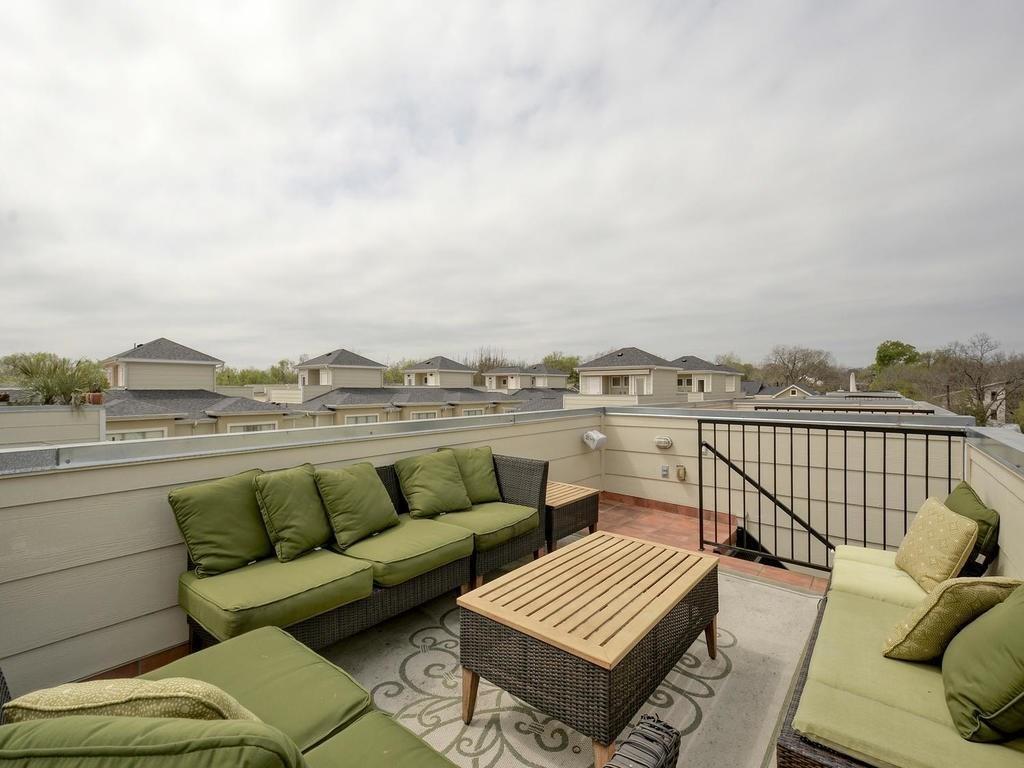 1115 Kinney Avenue, Unit 41 Austin, TX 78704 - Photo 24 of 26 a view of roof deck with furniture