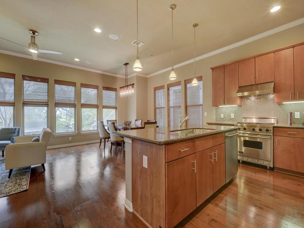 1115 Kinney Avenue, Unit 41 Austin, TX 78704 - Photo 9 of 26 a kitchen with lots of counter top space and dining table