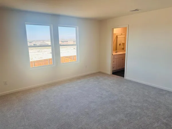 an empty room with windows