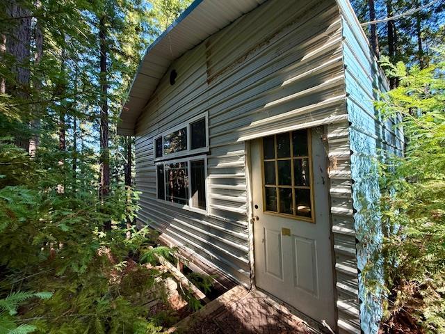 7175 Redwood Retreat Road Gilroy, CA 95020 - Photo 16 of 46 a view of a house with a yard