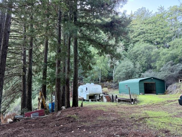 7175 Redwood Retreat Road Gilroy, CA 95020 - Photo 5 of 46 a view of a house with a yard and tree