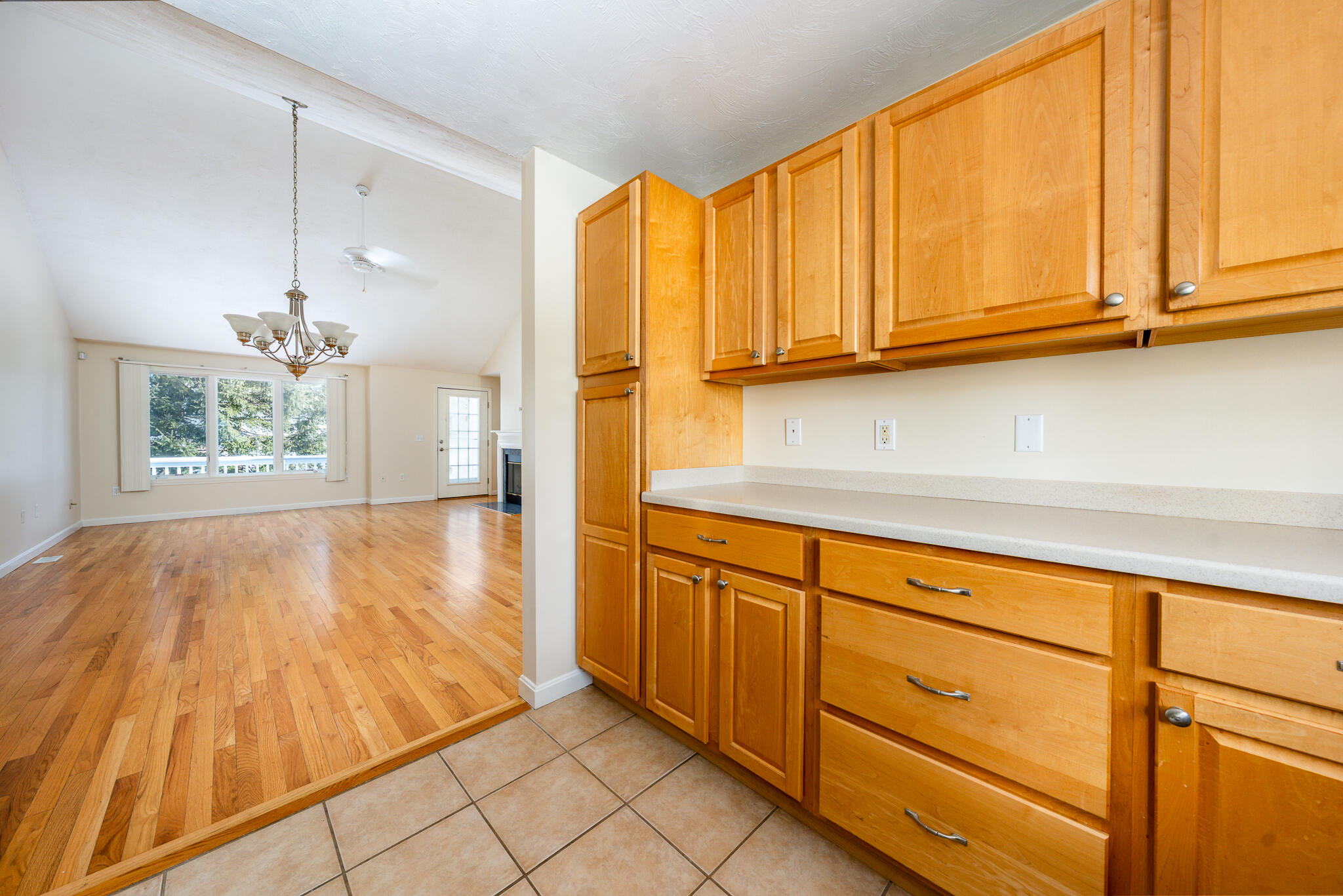 1 Masters Court Mashpee, MA 02649 - Photo 8 of 32 a view of a kitchen with wooden floor and a window