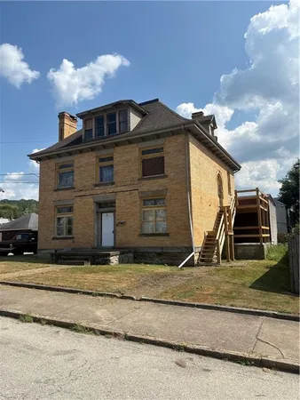 a front view of house with yard