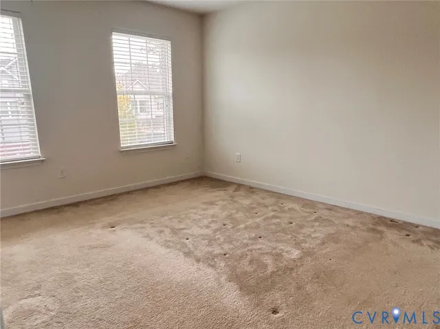 a bathroom with a tub and a shower