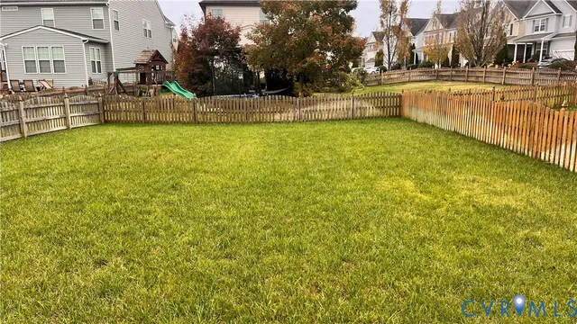 a view of balcony with wooden floor
