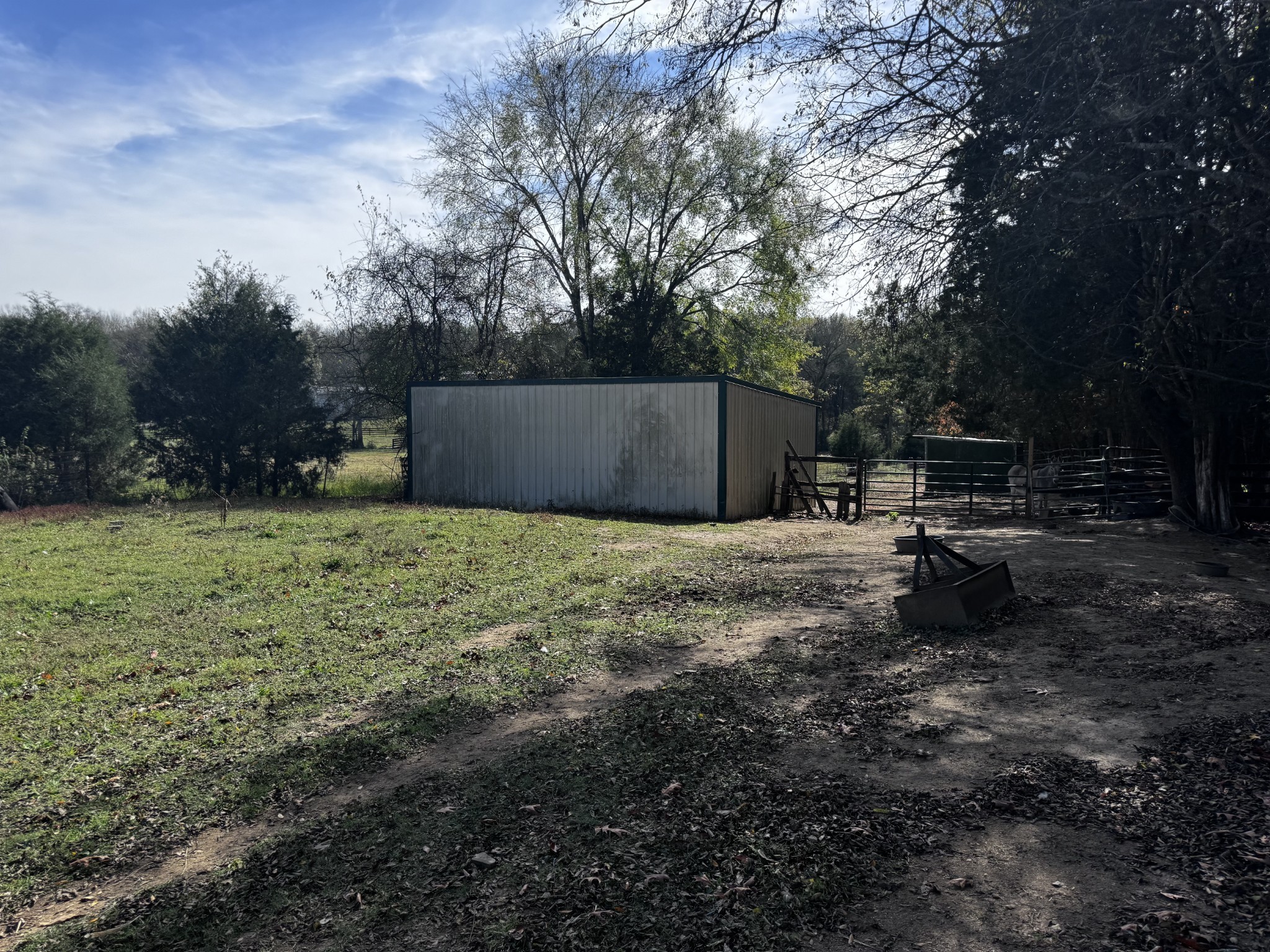 1525 Harkreader Road Mount Juliet, TN 37122 - Photo 11 of 20 a backyard of a house with yard and trampoline