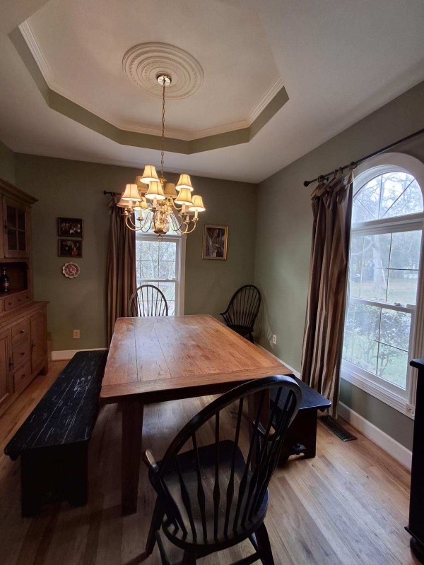 1525 Harkreader Road Mount Juliet, TN 37122 - Photo 4 of 20 a view of a dining room with furniture window and wooden floor
