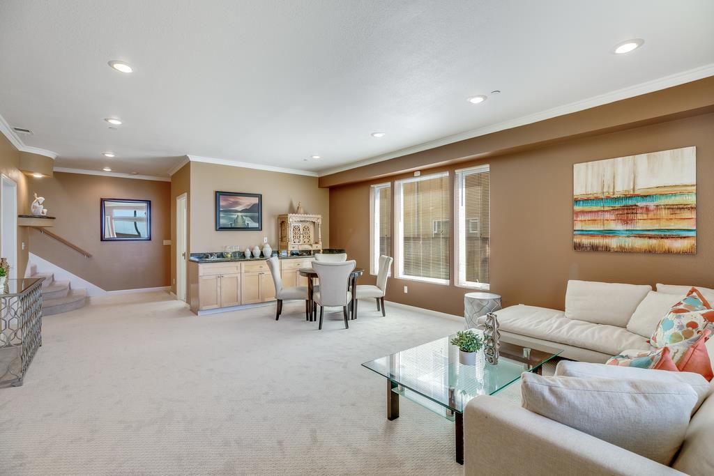 641 Hickey Boulevard Pacifica, CA 94044 - Photo 19 of 32 a living room with furniture and a large window