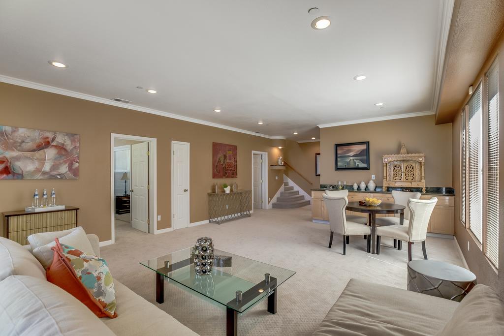 641 Hickey Boulevard Pacifica, CA 94044 - Photo 20 of 32 a living room with furniture and a wooden floor