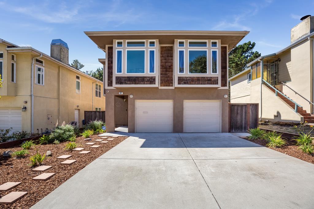 641 Hickey Boulevard Pacifica, CA 94044 - Photo 2 of 32 a front view of a house with garden