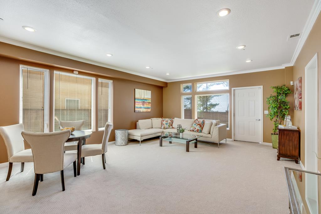 641 Hickey Boulevard Pacifica, CA 94044 - Photo 21 of 32 a living room with furniture and large windows