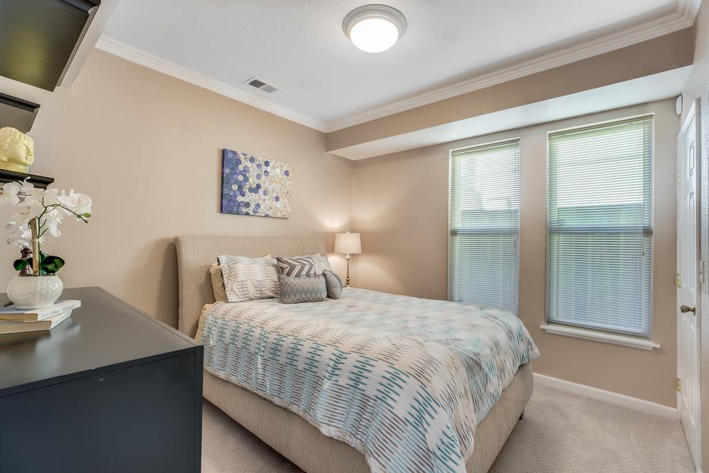 641 Hickey Boulevard Pacifica, CA 94044 - Photo 23 of 32 a bedroom with a large bed and a window