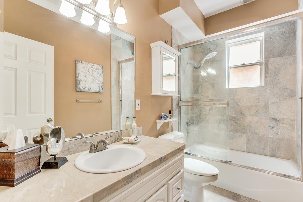 641 Hickey Boulevard Pacifica, CA 94044 - Photo 25 of 32 a bathroom with a sink a toilet and shower