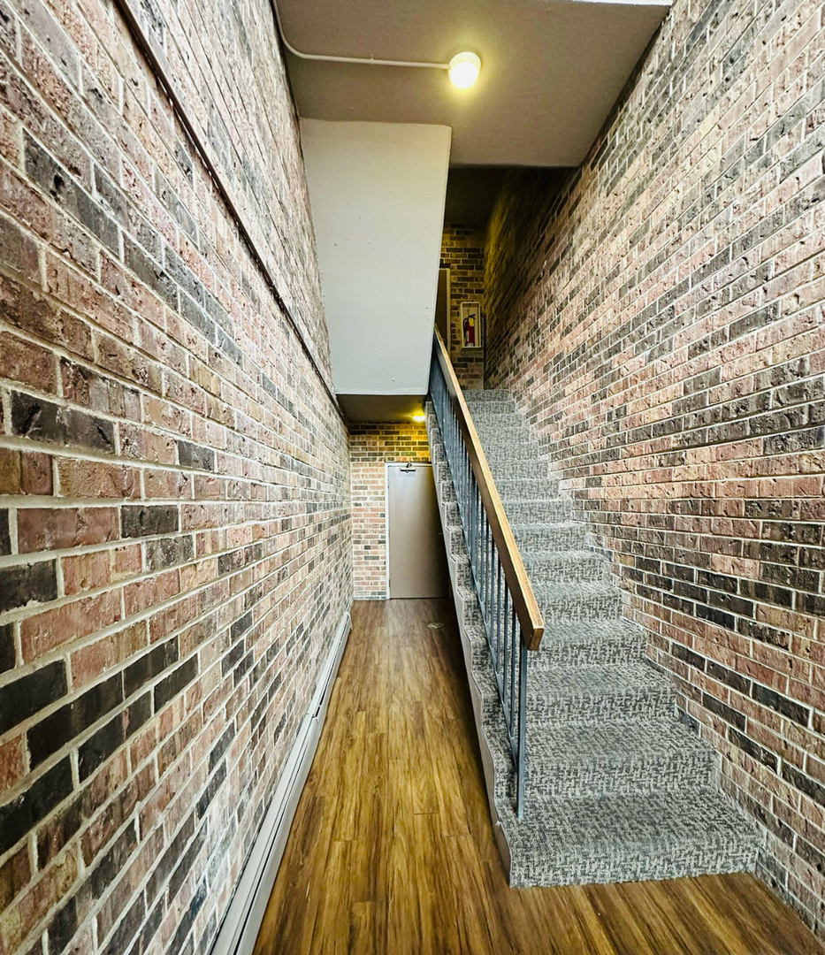 3515 Central Road, Unit 103 Glenview, IL 60025 - Photo 18 of 27 a view of balcony with wooden floor