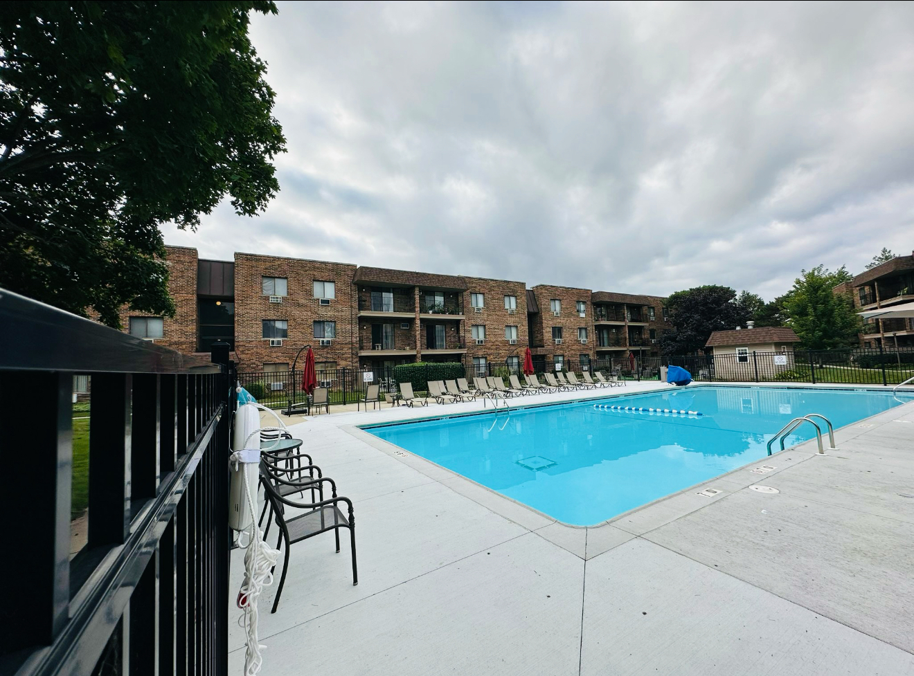 3515 Central Road, Unit 103 Glenview, IL 60025 - Photo 21 of 27 a view of a swimming pool with seating space